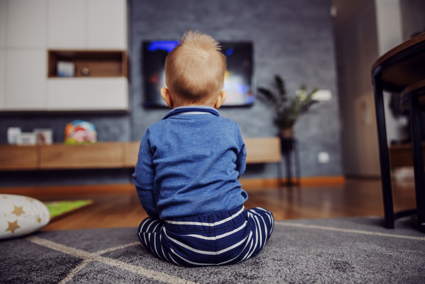 Young boy watching TV