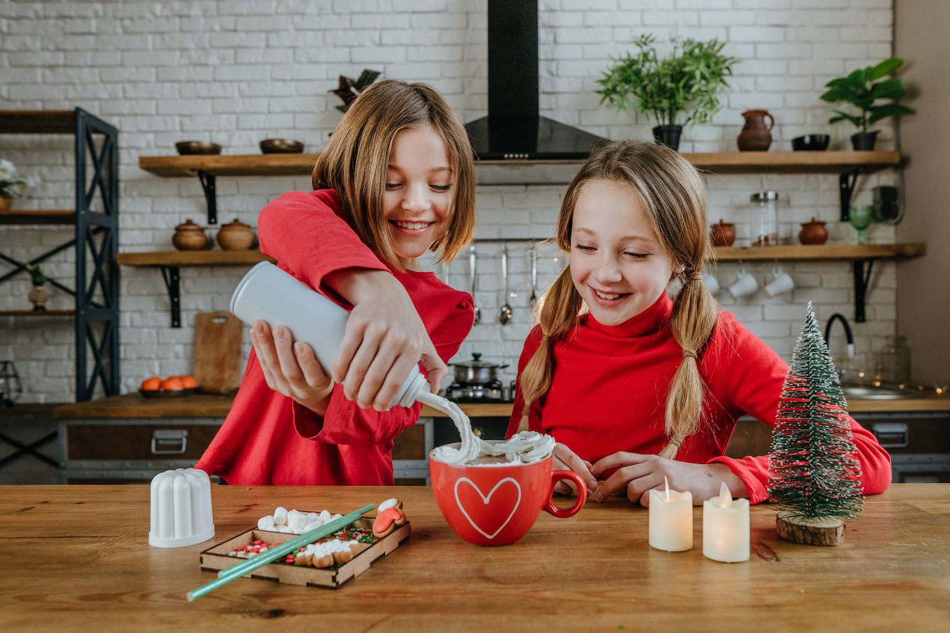 Girls making hot chocolate