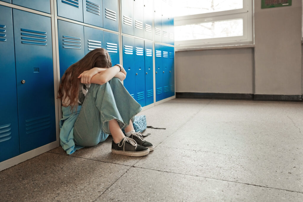 girl crying at school