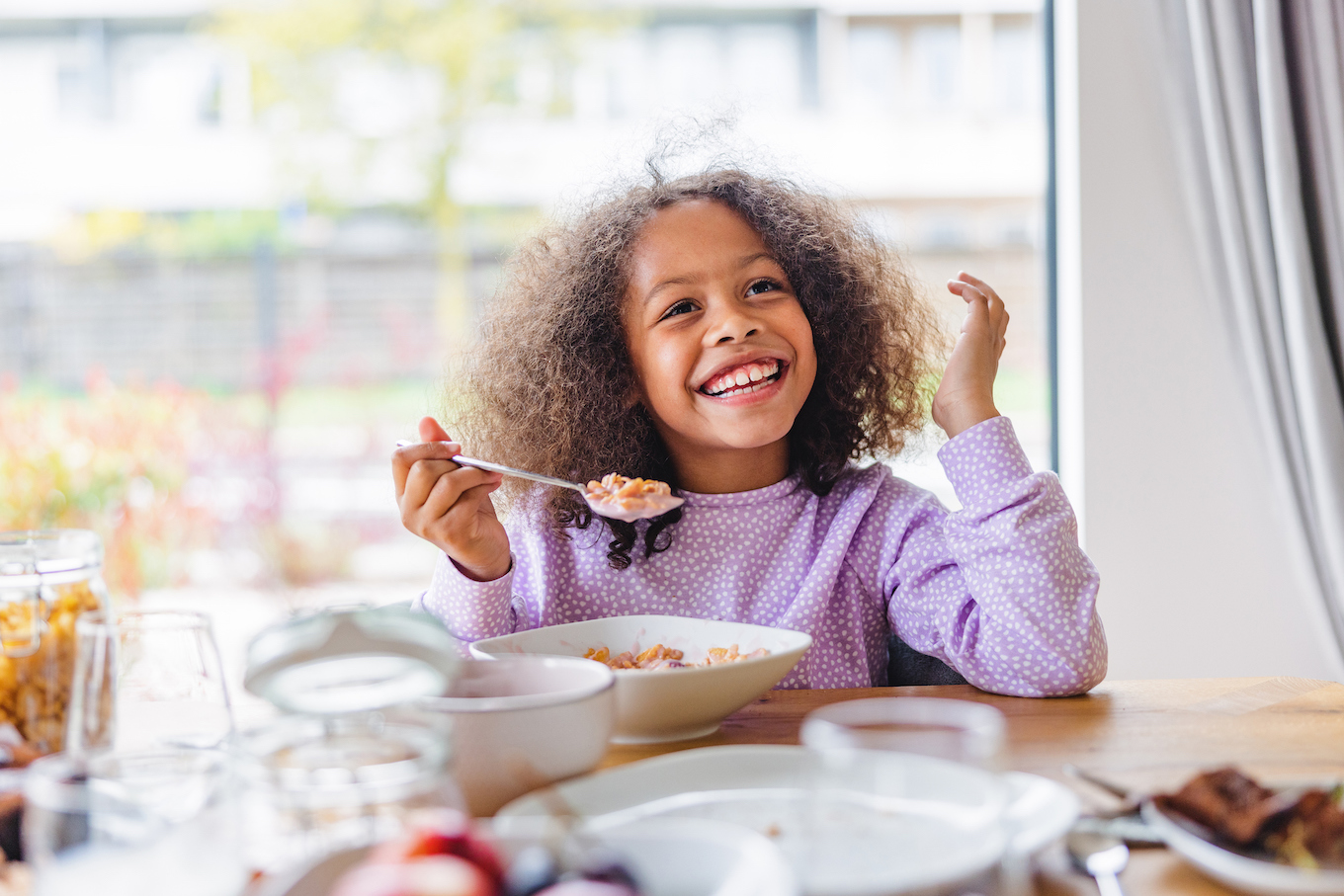 Girl eating breakfast
